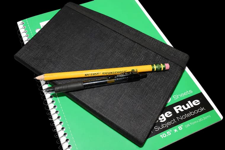 Nik Kennedy's notebooks, pencil, and pen